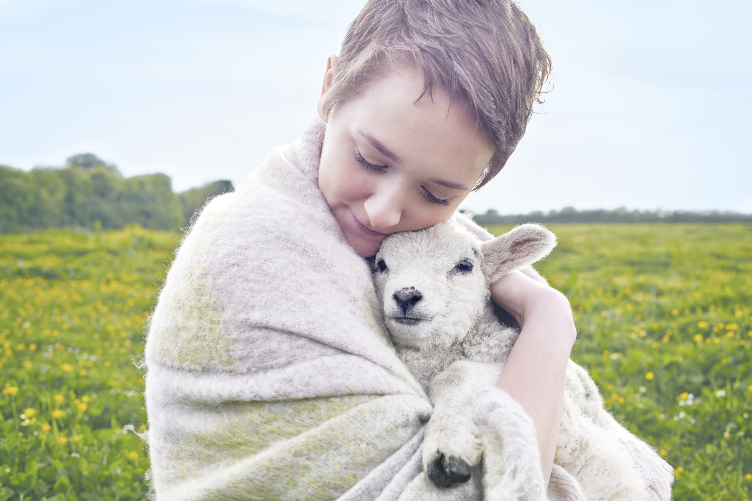 a-tender-moment-as-a-child-embraces-a-lamb-in-a-su-2025-04-03-02-29-04-utc