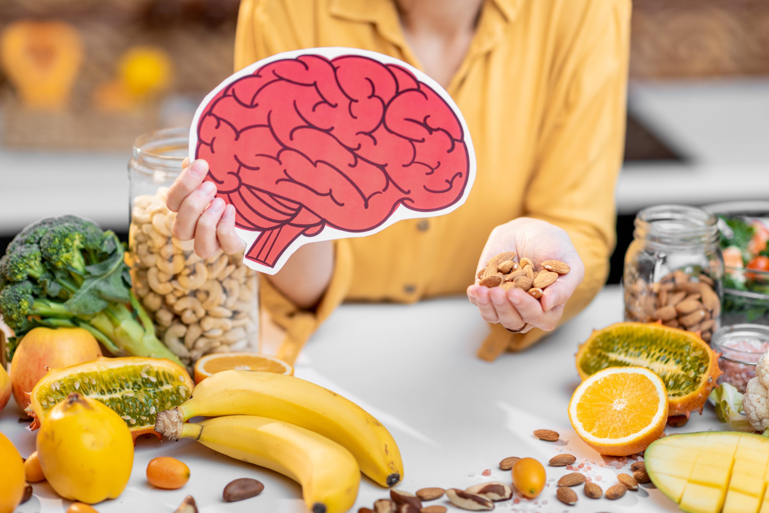 human-brain-model-and-variety-of-healthy-fresh-foo-2025-04-02-07-14-41-utc