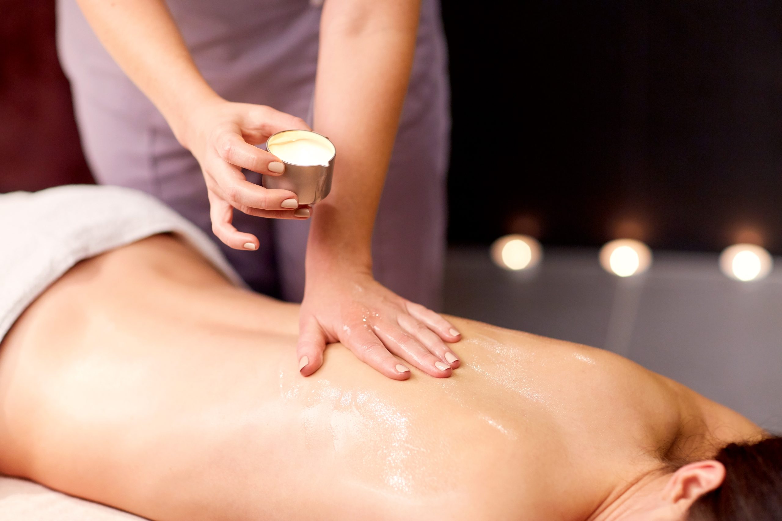 woman-lying-and-having-back-massage-at-spa-2024-09-27-14-06-50-utc